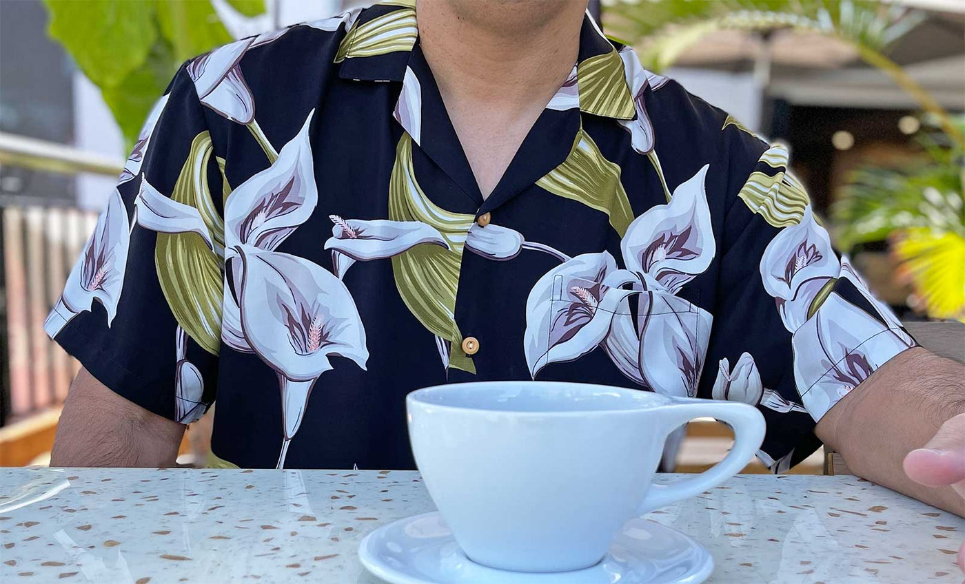 morning coffee in the Calla Lily black Hawaiian shirt that was worn on Magnum PI Season 4 Episode 1
