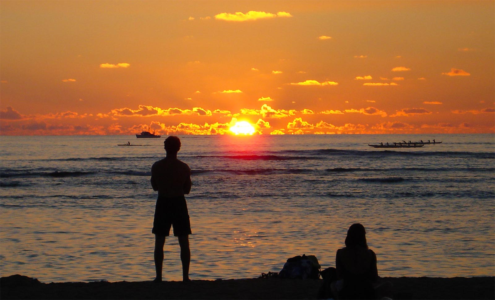 canoe paddlers at sunset in Waikiki